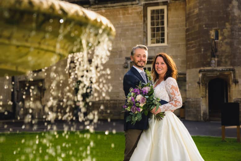 Fountain, with bride and groom wedding photography at Thornbury Castle