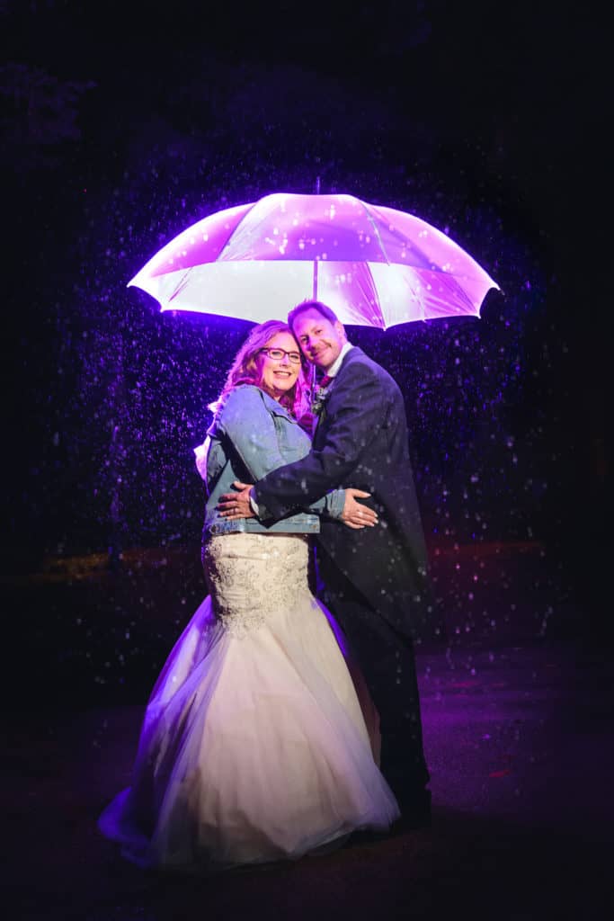 Bride &amp; Groom rain wedding photography at The Lord Mayors Mansion